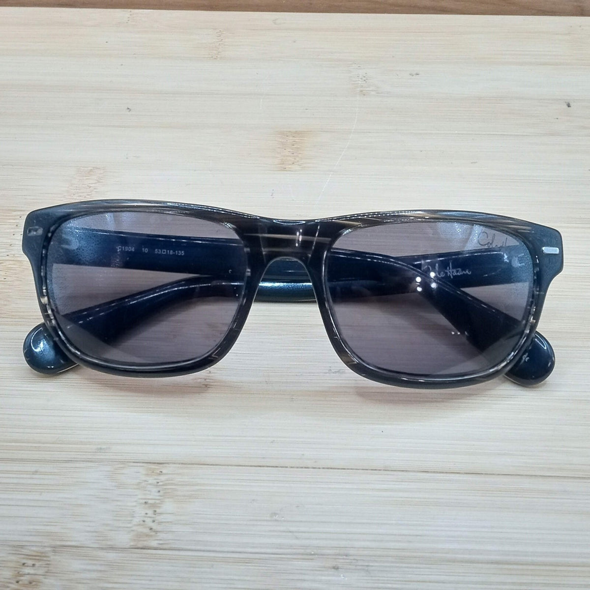 Cole Haan Black and Clear Swirl Rectangular 53-18-135 Sunglasses C1904