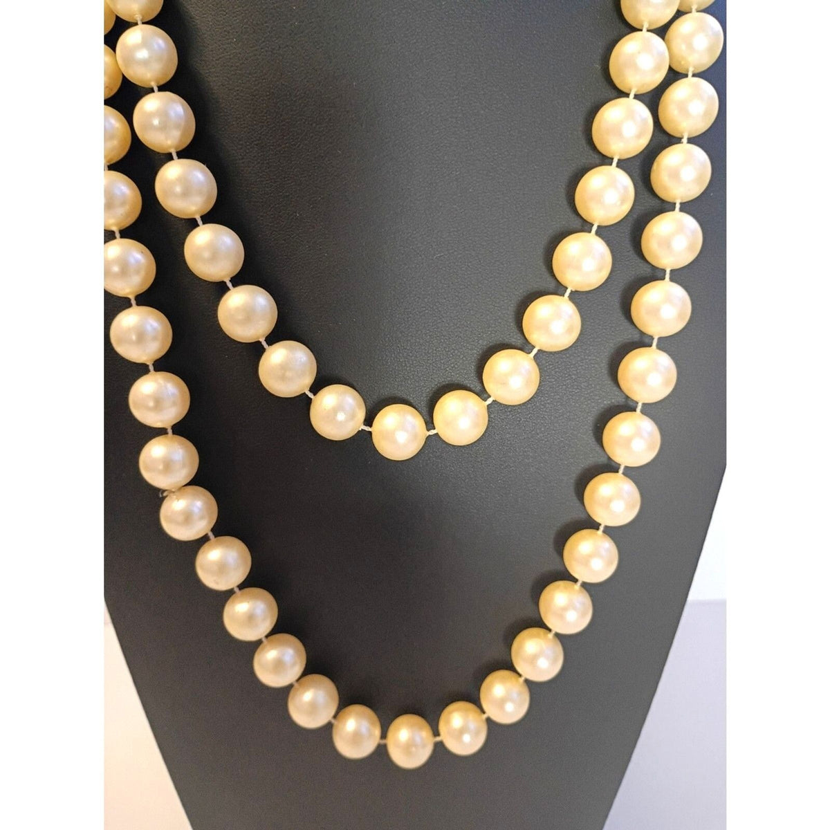 Elegant Vintage Style Rope Necklace features Warm, Cream Colored Faux Pearls