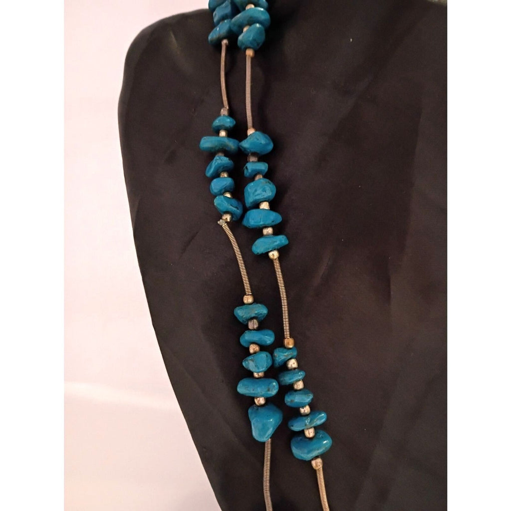 Navajo Style Necklace features Blue Painted Stones and Spring Metal Spacers
