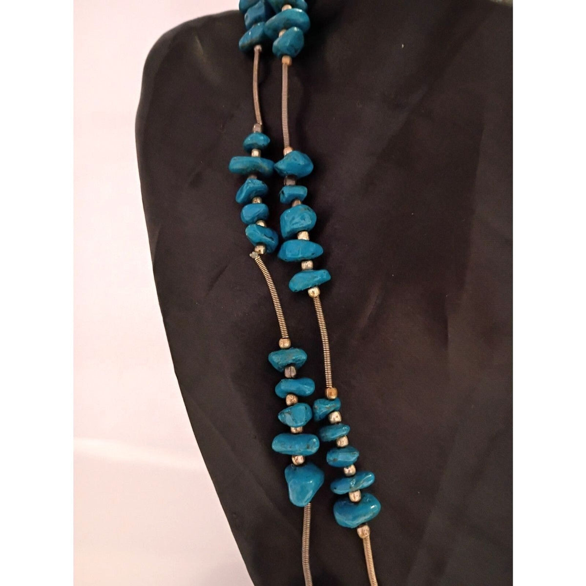 Navajo Style Necklace features Blue Painted Stones and Spring Metal Spacers
