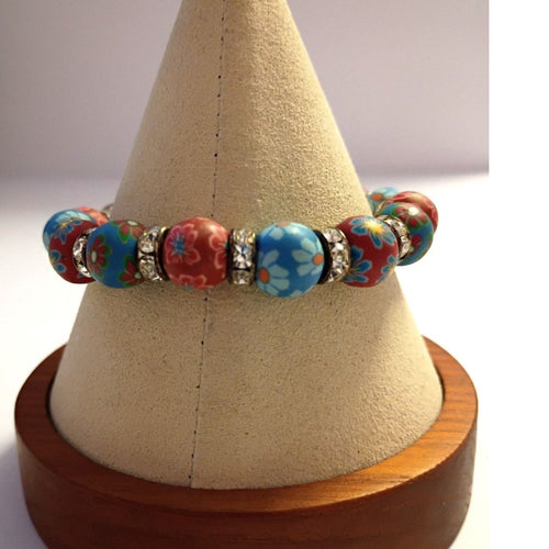 Bracelet of Rubber Flower beads Red and Blue floral patterns, Rhinestone spacers