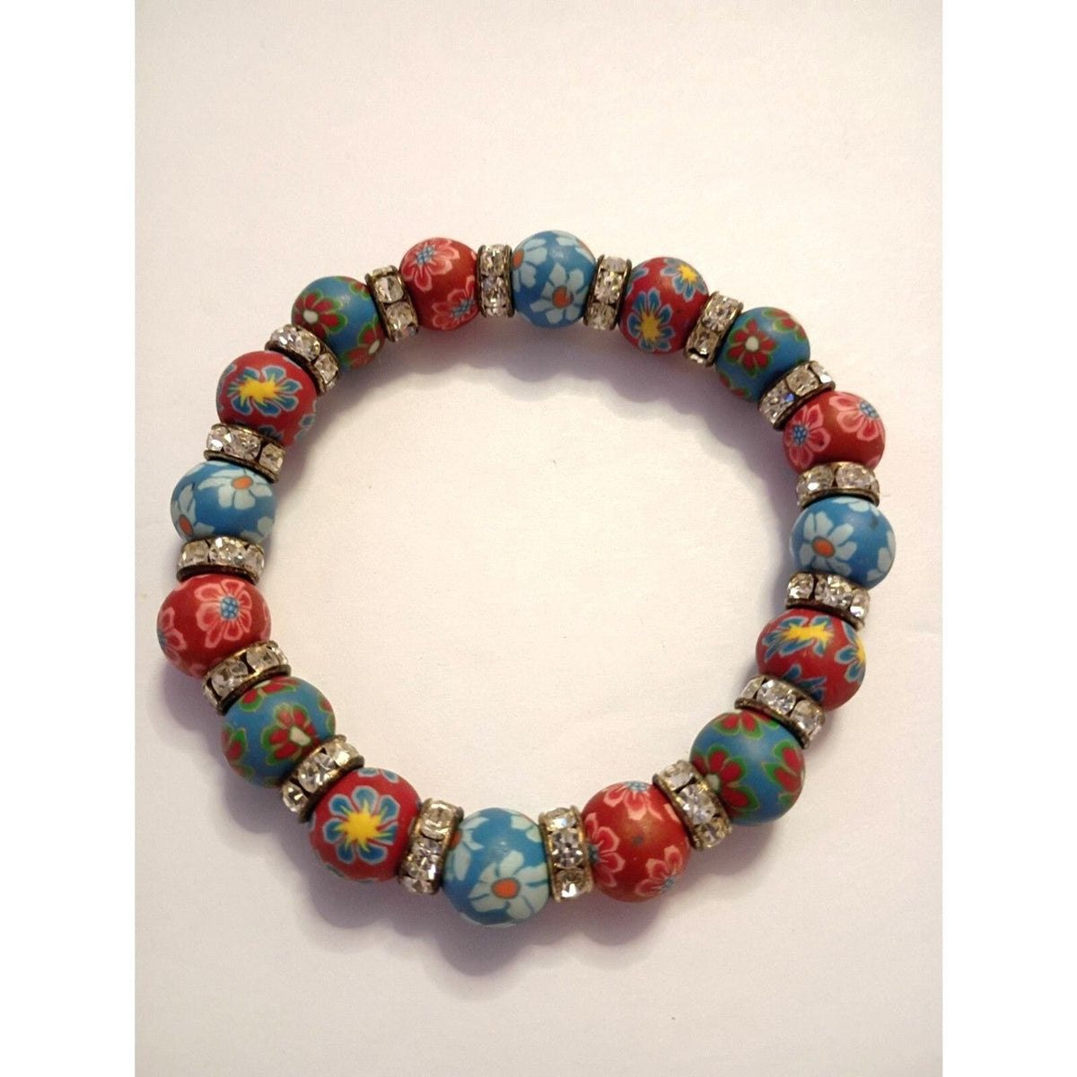 Bracelet of Rubber Flower beads Red and Blue floral patterns, Rhinestone spacers