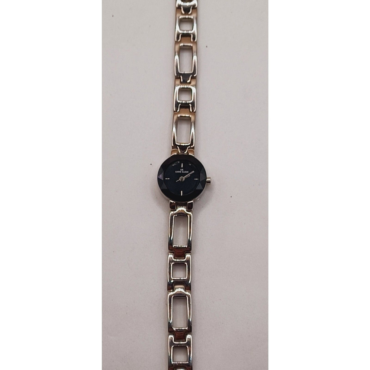 Anne Klein Diamond Black Dial Round Case Wristwatch