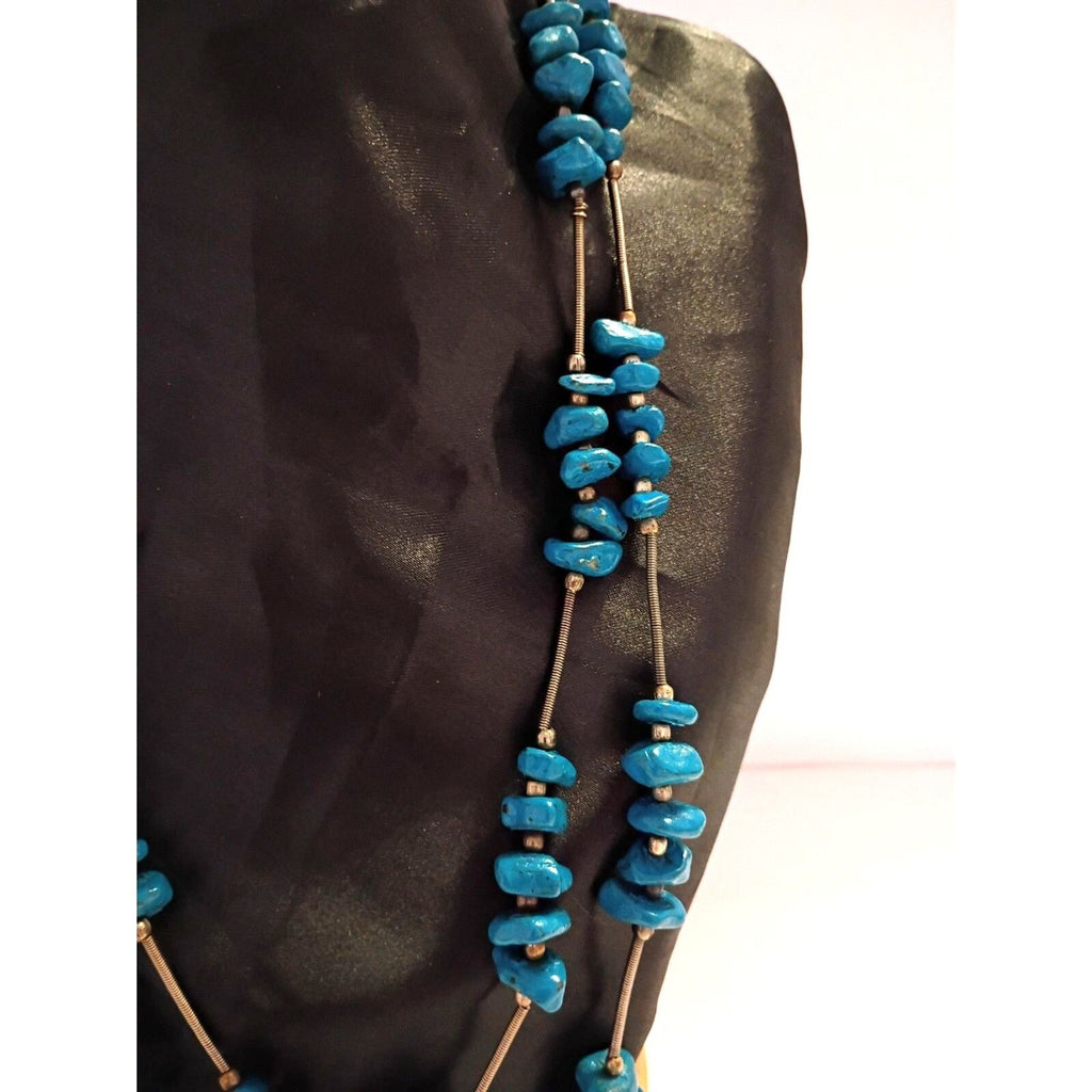 Navajo Style Necklace features Blue Painted Stones and Spring Metal Spacers