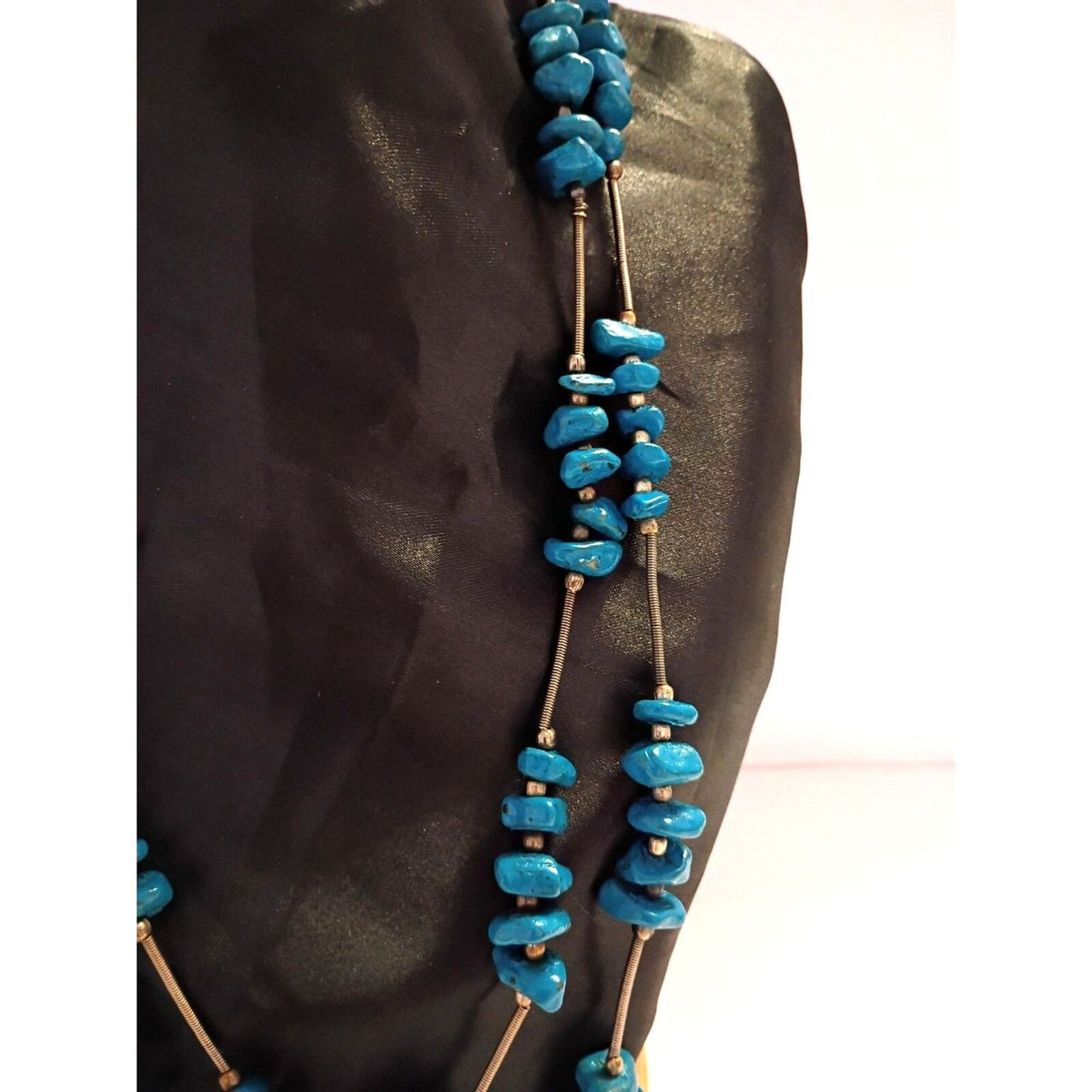 Navajo Style Necklace features Blue Painted Stones and Spring Metal Spacers