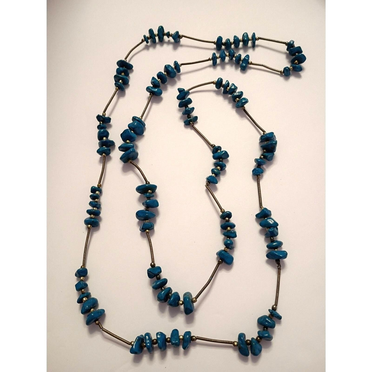 Navajo Style Necklace features Blue Painted Stones and Spring Metal Spacers