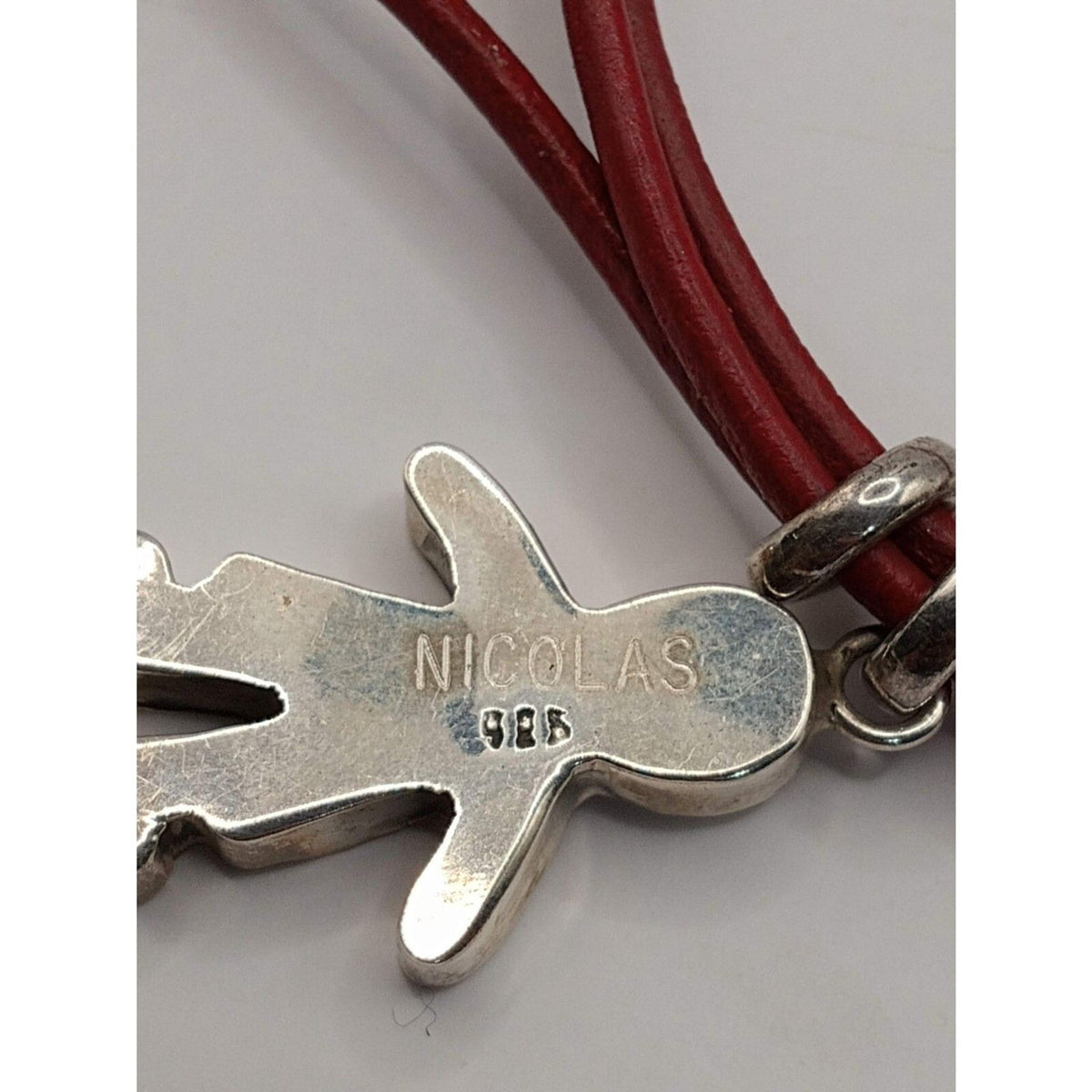 Sterling Silver Nicholas Boy Pendant on Red Leather Toggle Necklace