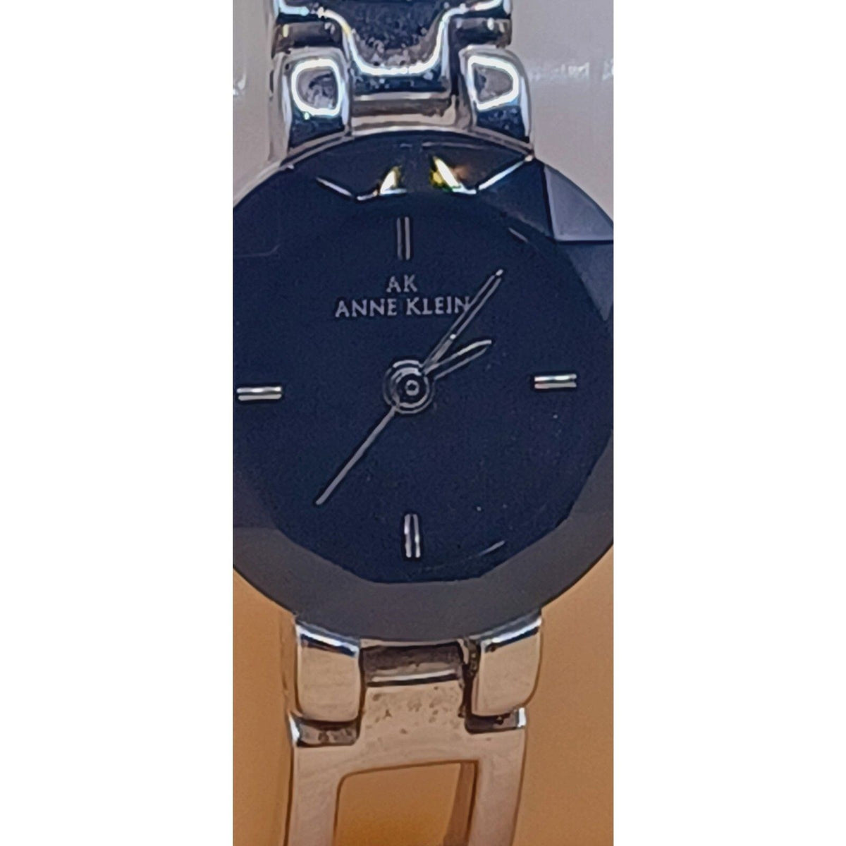 Anne Klein Diamond Black Dial Round Case Wristwatch