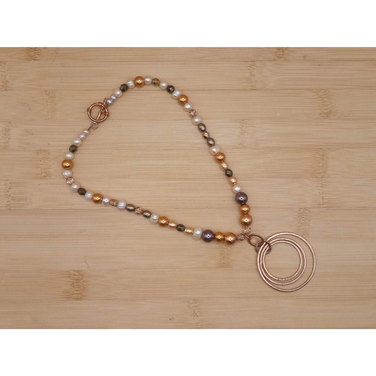 Chocolate & Copper Faux Pearl Beaded Necklace with Concentric Circle Pendant