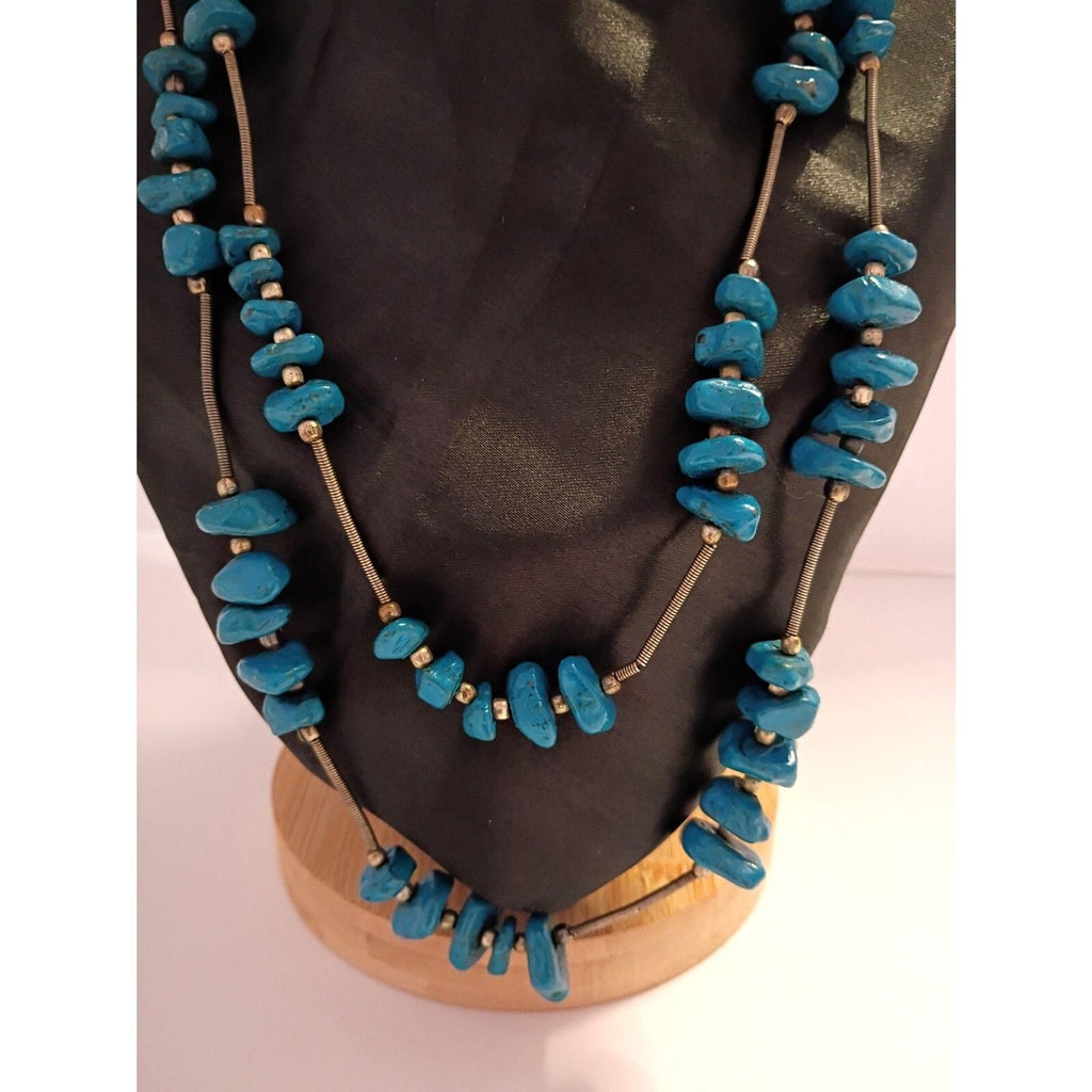 Navajo Style Necklace features Blue Painted Stones and Spring Metal Spacers