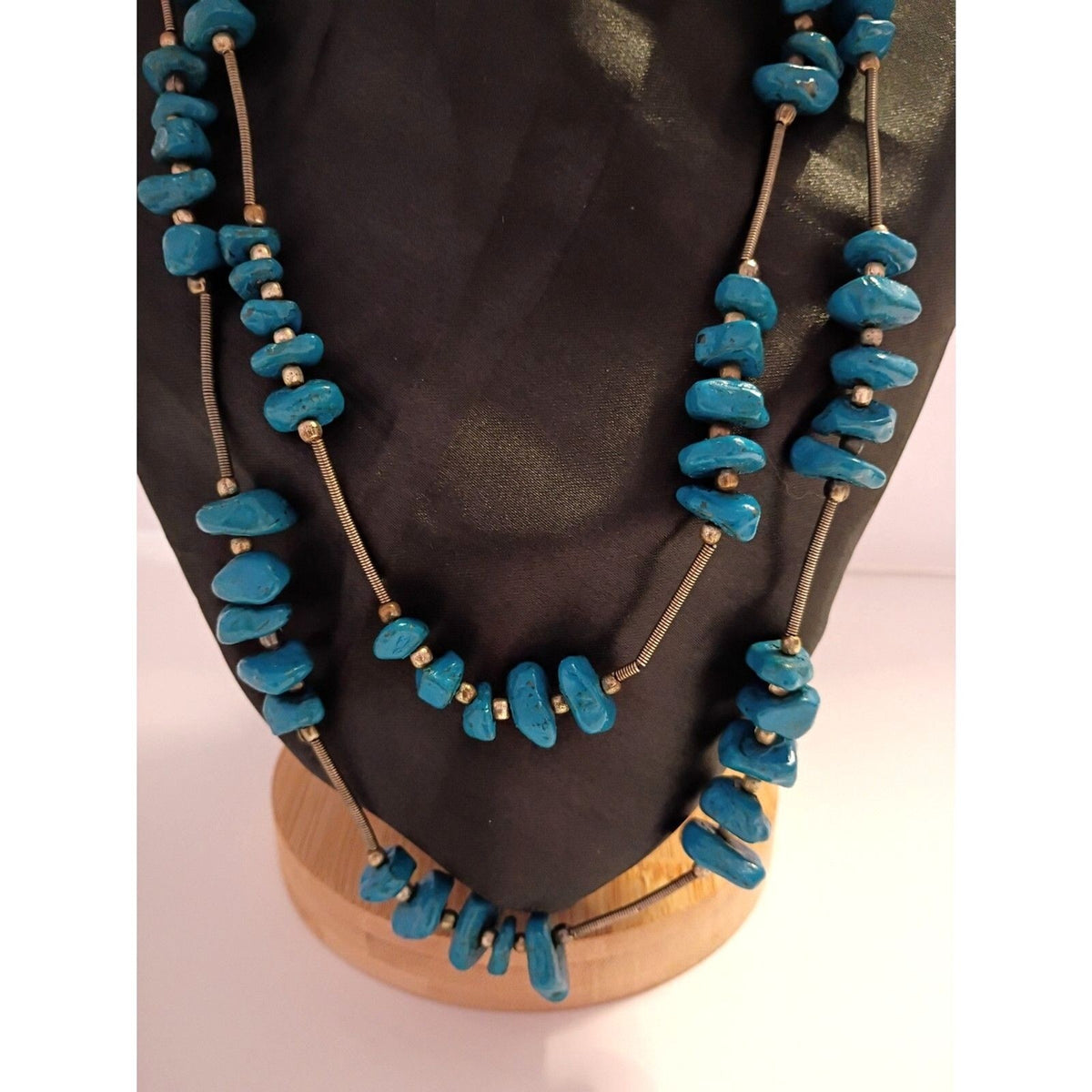 Navajo Style Necklace features Blue Painted Stones and Spring Metal Spacers