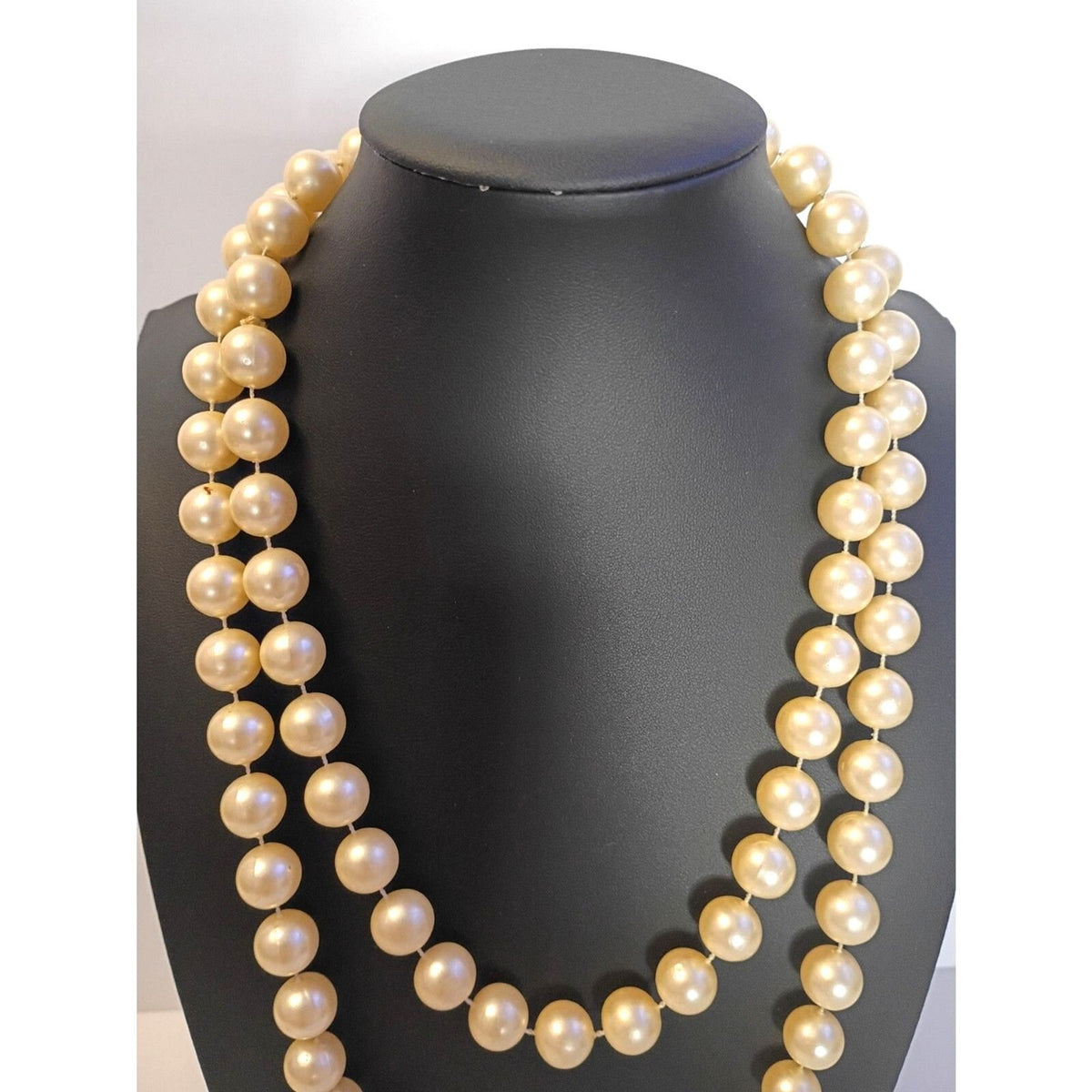 Elegant Vintage Style Rope Necklace features Warm, Cream Colored Faux Pearls