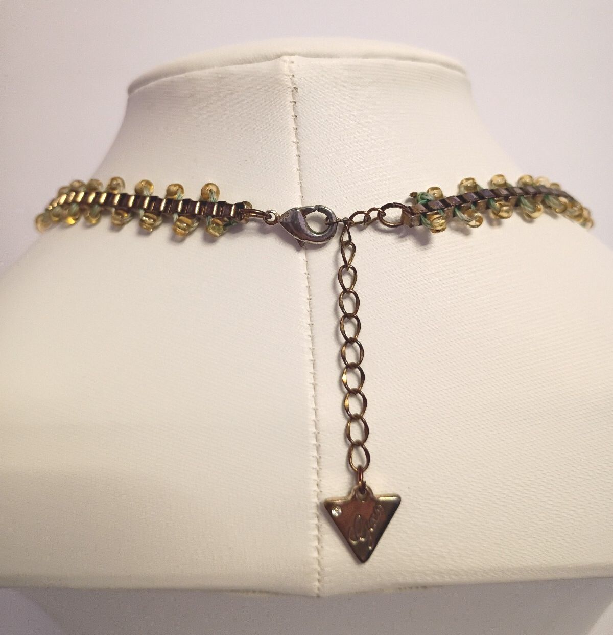 Designer Signed Guess, Collar Necklace is Gold Tone with Yellow Seed Beads