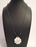 Dainty Little Necklace of a White Flower Pendant on a Blue Adjustable Cord